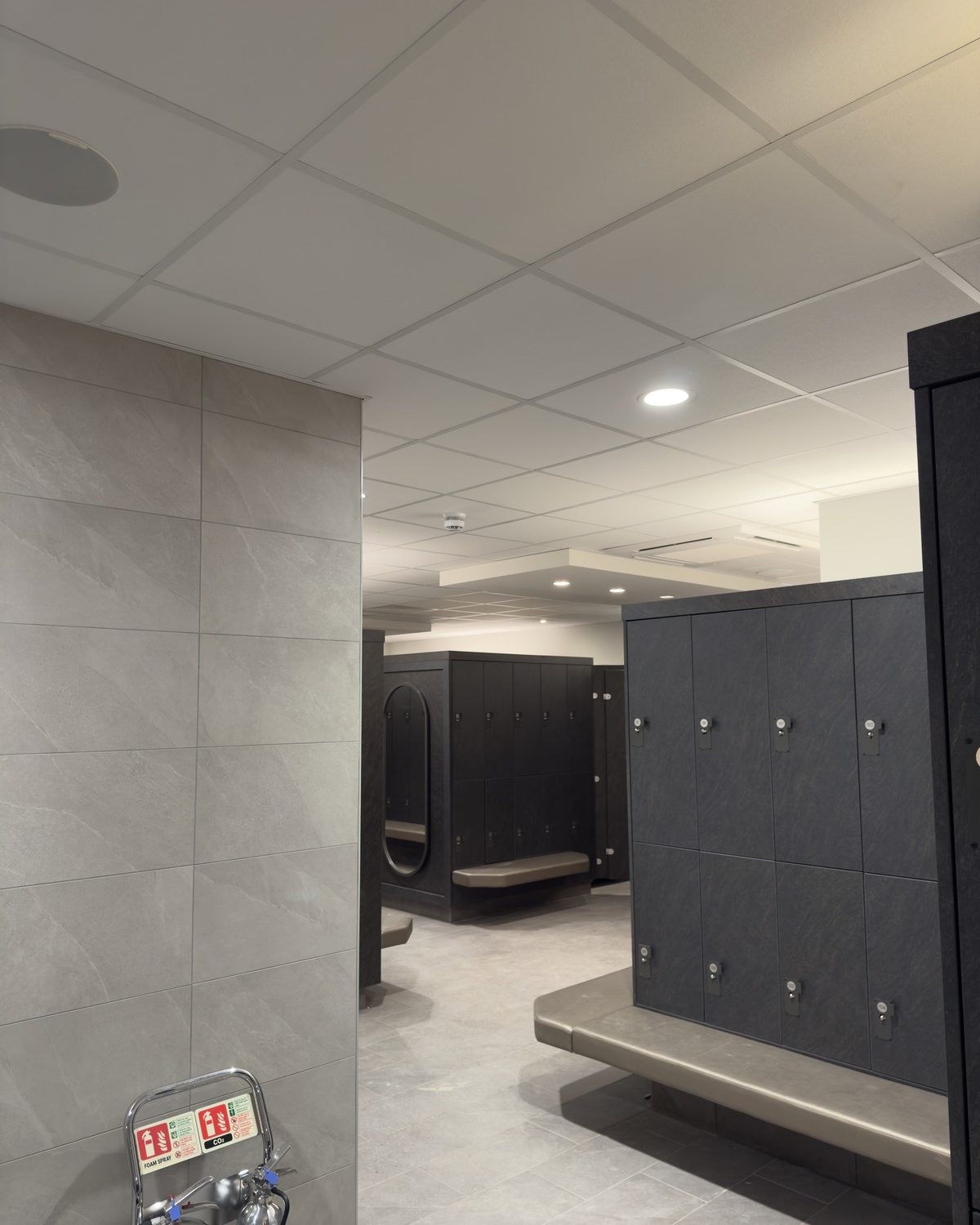 Suspended ceiling and bulkheads over the changing rooms at David Lloyd, St Neots